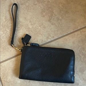 Coach black wristlet.